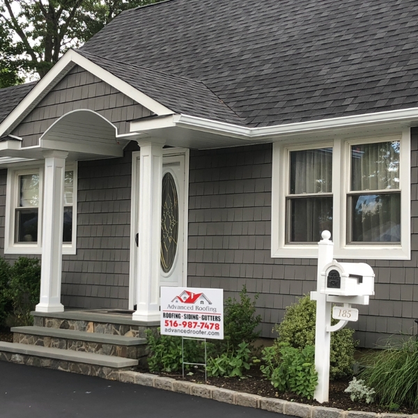 roof installation in west babylon driveway view